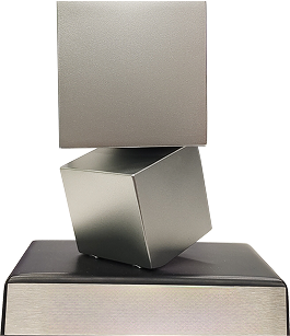 A metal trophy with stacked, tilted cubes