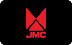 A male DJ on stage with a crowd