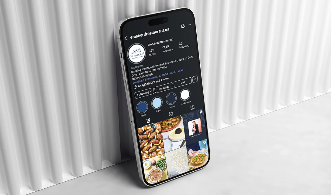 Phone showing Em Sherif Instagram profile display
