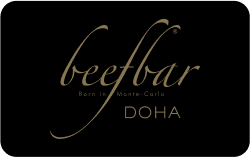 A gold "beefbar DOHA" logo on black